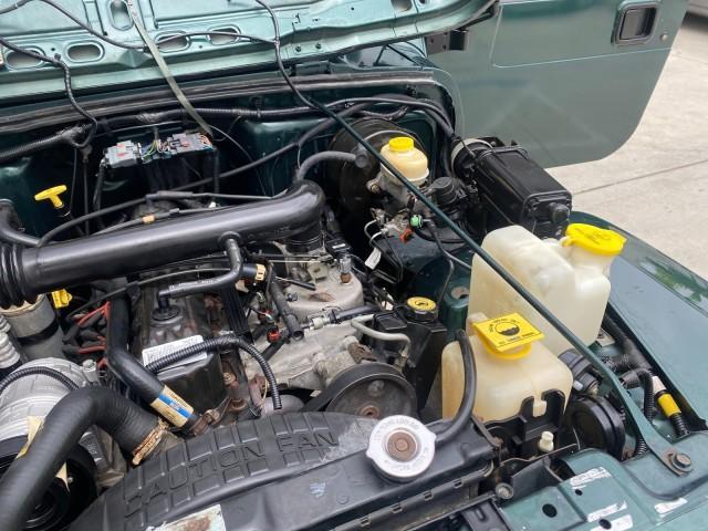 1999 Forest Green Pearl /Camel/Dark Green Jeep Wrangler Sahara AUYO AC 6 CYL LOW MILES 47,009 (1J4FY49S0XP) with an 4.0L SMPI I6 Power Tech Engine engine, Automatic transmission, located at 4701 North Dixie Hwy, Pompano Beach, FL, 33064, (954) 422-2889, 26.240938, -80.123474 - OUR WEBPAGE FLORIDACARS1.COM HAS OVER 100 PHOTOS AND FREE CARFAX LINK 1999 Jeep Wrangler Sahara Utility (Blazer, Jimmy, Scout, etc.) 4.0L I6 F Gasoline 20 MPG Rear Wheel Drive w/ 4X4 Features 4WD/AWD ABS Brakes Air Conditioning Alloy Wheels AM/FM Stereo Automatic Transmission Cassette Player CD Audi - Photo#25