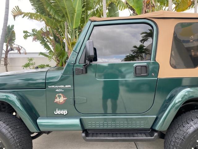 1999 Forest Green Pearl /Camel/Dark Green Jeep Wrangler Sahara AUYO AC 6 CYL LOW MILES 47,009 (1J4FY49S0XP) with an 4.0L SMPI I6 Power Tech Engine engine, Automatic transmission, located at 4701 North Dixie Hwy, Pompano Beach, FL, 33064, (954) 422-2889, 26.240938, -80.123474 - OUR WEBPAGE FLORIDACARS1.COM HAS OVER 100 PHOTOS AND FREE CARFAX LINK 1999 Jeep Wrangler Sahara Utility (Blazer, Jimmy, Scout, etc.) 4.0L I6 F Gasoline 20 MPG Rear Wheel Drive w/ 4X4 Features 4WD/AWD ABS Brakes Air Conditioning Alloy Wheels AM/FM Stereo Automatic Transmission Cassette Player CD Audi - Photo#36