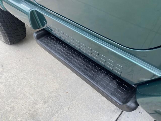 1999 Forest Green Pearl /Camel/Dark Green Jeep Wrangler Sahara AUYO AC 6 CYL LOW MILES 47,009 (1J4FY49S0XP) with an 4.0L SMPI I6 Power Tech Engine engine, Automatic transmission, located at 4701 North Dixie Hwy, Pompano Beach, FL, 33064, (954) 422-2889, 26.240938, -80.123474 - OUR WEBPAGE FLORIDACARS1.COM HAS OVER 100 PHOTOS AND FREE CARFAX LINK 1999 Jeep Wrangler Sahara Utility (Blazer, Jimmy, Scout, etc.) 4.0L I6 F Gasoline 20 MPG Rear Wheel Drive w/ 4X4 Features 4WD/AWD ABS Brakes Air Conditioning Alloy Wheels AM/FM Stereo Automatic Transmission Cassette Player CD Audi - Photo#40