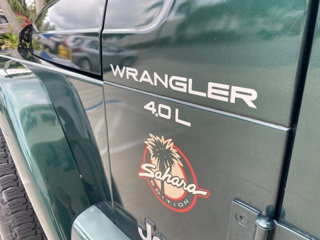 1999 Forest Green Pearl /Camel/Dark Green Jeep Wrangler Sahara AUYO AC 6 CYL LOW MILES 47,009 (1J4FY49S0XP) with an 4.0L SMPI I6 Power Tech Engine engine, Automatic transmission, located at 4701 North Dixie Hwy, Pompano Beach, FL, 33064, (954) 422-2889, 26.240938, -80.123474 - OUR WEBPAGE FLORIDACARS1.COM HAS OVER 100 PHOTOS AND FREE CARFAX LINK 1999 Jeep Wrangler Sahara Utility (Blazer, Jimmy, Scout, etc.) 4.0L I6 F Gasoline 20 MPG Rear Wheel Drive w/ 4X4 Features 4WD/AWD ABS Brakes Air Conditioning Alloy Wheels AM/FM Stereo Automatic Transmission Cassette Player CD Audi - Photo#42