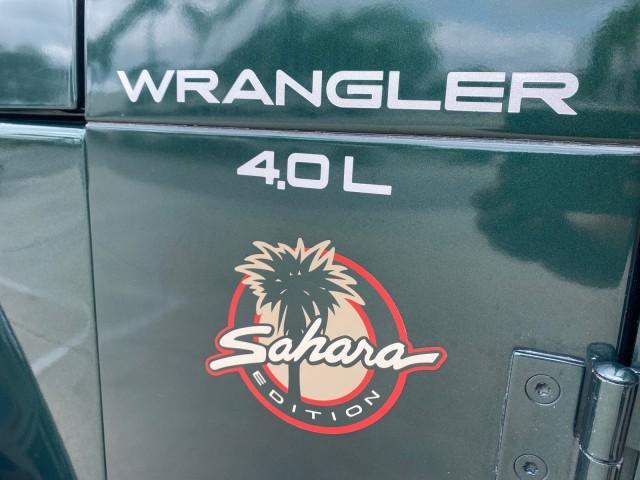 1999 Forest Green Pearl /Camel/Dark Green Jeep Wrangler Sahara AUYO AC 6 CYL LOW MILES 47,009 (1J4FY49S0XP) with an 4.0L SMPI I6 Power Tech Engine engine, Automatic transmission, located at 4701 North Dixie Hwy, Pompano Beach, FL, 33064, (954) 422-2889, 26.240938, -80.123474 - OUR WEBPAGE FLORIDACARS1.COM HAS OVER 100 PHOTOS AND FREE CARFAX LINK 1999 Jeep Wrangler Sahara Utility (Blazer, Jimmy, Scout, etc.) 4.0L I6 F Gasoline 20 MPG Rear Wheel Drive w/ 4X4 Features 4WD/AWD ABS Brakes Air Conditioning Alloy Wheels AM/FM Stereo Automatic Transmission Cassette Player CD Audi - Photo#43