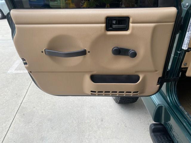 1999 Forest Green Pearl /Camel/Dark Green Jeep Wrangler Sahara AUYO AC 6 CYL LOW MILES 47,009 (1J4FY49S0XP) with an 4.0L SMPI I6 Power Tech Engine engine, Automatic transmission, located at 4701 North Dixie Hwy, Pompano Beach, FL, 33064, (954) 422-2889, 26.240938, -80.123474 - OUR WEBPAGE FLORIDACARS1.COM HAS OVER 100 PHOTOS AND FREE CARFAX LINK 1999 Jeep Wrangler Sahara Utility (Blazer, Jimmy, Scout, etc.) 4.0L I6 F Gasoline 20 MPG Rear Wheel Drive w/ 4X4 Features 4WD/AWD ABS Brakes Air Conditioning Alloy Wheels AM/FM Stereo Automatic Transmission Cassette Player CD Audi - Photo#44
