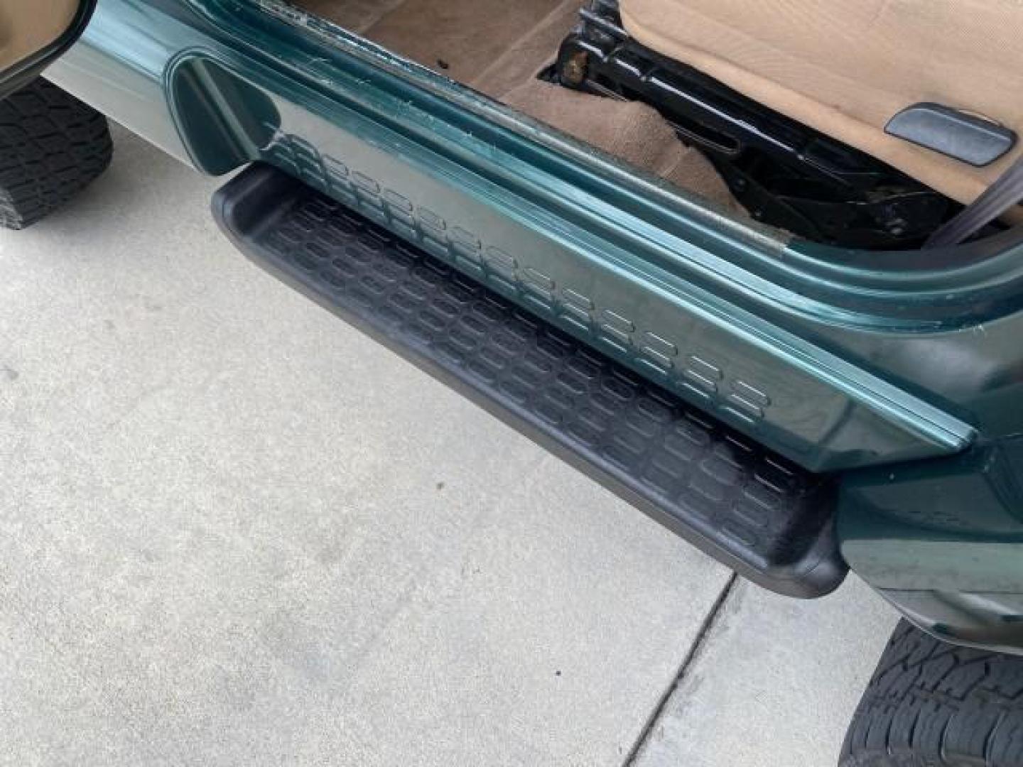 1999 Forest Green Pearl /Camel/Dark Green Jeep Wrangler Sahara AUYO AC 6 CYL LOW MILES 47,009 (1J4FY49S0XP) with an 4.0L SMPI I6 Power Tech Engine engine, Automatic transmission, located at 4701 North Dixie Hwy, Pompano Beach, FL, 33064, (954) 422-2889, 26.240938, -80.123474 - OUR WEBPAGE FLORIDACARS1.COM HAS OVER 100 PHOTOS AND FREE CARFAX LINK 1999 Jeep Wrangler Sahara Utility (Blazer, Jimmy, Scout, etc.) 4.0L I6 F Gasoline 20 MPG Rear Wheel Drive w/ 4X4 Features 4WD/AWD ABS Brakes Air Conditioning Alloy Wheels AM/FM Stereo Automatic Transmission Cassette Player CD Audi - Photo#45