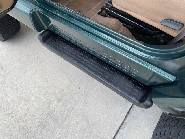 1999 Forest Green Pearl /Camel/Dark Green Jeep Wrangler Sahara AUYO AC 6 CYL LOW MILES 47,009 (1J4FY49S0XP) with an 4.0L SMPI I6 Power Tech Engine engine, Automatic transmission, located at 4701 North Dixie Hwy, Pompano Beach, FL, 33064, (954) 422-2889, 26.240938, -80.123474 - OUR WEBPAGE FLORIDACARS1.COM HAS OVER 100 PHOTOS AND FREE CARFAX LINK 1999 Jeep Wrangler Sahara Utility (Blazer, Jimmy, Scout, etc.) 4.0L I6 F Gasoline 20 MPG Rear Wheel Drive w/ 4X4 Features 4WD/AWD ABS Brakes Air Conditioning Alloy Wheels AM/FM Stereo Automatic Transmission Cassette Player CD Audi - Photo#45