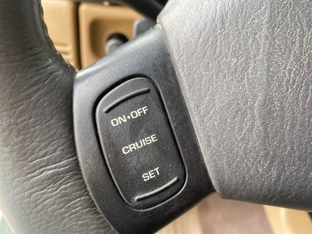1999 Forest Green Pearl /Camel/Dark Green Jeep Wrangler Sahara AUYO AC 6 CYL LOW MILES 47,009 (1J4FY49S0XP) with an 4.0L SMPI I6 Power Tech Engine engine, Automatic transmission, located at 4701 North Dixie Hwy, Pompano Beach, FL, 33064, (954) 422-2889, 26.240938, -80.123474 - OUR WEBPAGE FLORIDACARS1.COM HAS OVER 100 PHOTOS AND FREE CARFAX LINK 1999 Jeep Wrangler Sahara Utility (Blazer, Jimmy, Scout, etc.) 4.0L I6 F Gasoline 20 MPG Rear Wheel Drive w/ 4X4 Features 4WD/AWD ABS Brakes Air Conditioning Alloy Wheels AM/FM Stereo Automatic Transmission Cassette Player CD Audi - Photo#52
