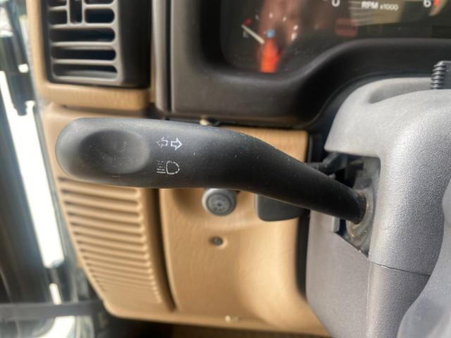 1999 Forest Green Pearl /Camel/Dark Green Jeep Wrangler Sahara AUYO AC 6 CYL LOW MILES 47,009 (1J4FY49S0XP) with an 4.0L SMPI I6 Power Tech Engine engine, Automatic transmission, located at 4701 North Dixie Hwy, Pompano Beach, FL, 33064, (954) 422-2889, 26.240938, -80.123474 - OUR WEBPAGE FLORIDACARS1.COM HAS OVER 100 PHOTOS AND FREE CARFAX LINK 1999 Jeep Wrangler Sahara Utility (Blazer, Jimmy, Scout, etc.) 4.0L I6 F Gasoline 20 MPG Rear Wheel Drive w/ 4X4 Features 4WD/AWD ABS Brakes Air Conditioning Alloy Wheels AM/FM Stereo Automatic Transmission Cassette Player CD Audi - Photo#55