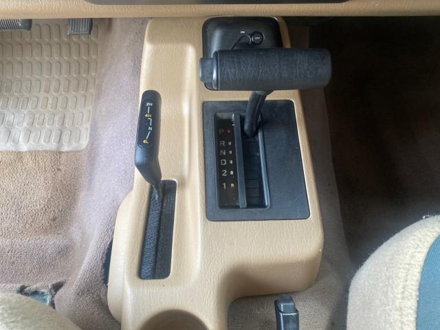 1999 Forest Green Pearl /Camel/Dark Green Jeep Wrangler Sahara AUYO AC 6 CYL LOW MILES 47,009 (1J4FY49S0XP) with an 4.0L SMPI I6 Power Tech Engine engine, Automatic transmission, located at 4701 North Dixie Hwy, Pompano Beach, FL, 33064, (954) 422-2889, 26.240938, -80.123474 - OUR WEBPAGE FLORIDACARS1.COM HAS OVER 100 PHOTOS AND FREE CARFAX LINK 1999 Jeep Wrangler Sahara Utility (Blazer, Jimmy, Scout, etc.) 4.0L I6 F Gasoline 20 MPG Rear Wheel Drive w/ 4X4 Features 4WD/AWD ABS Brakes Air Conditioning Alloy Wheels AM/FM Stereo Automatic Transmission Cassette Player CD Audi - Photo#63