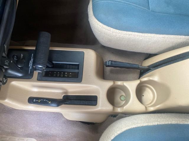 1999 Forest Green Pearl /Camel/Dark Green Jeep Wrangler Sahara AUYO AC 6 CYL LOW MILES 47,009 (1J4FY49S0XP) with an 4.0L SMPI I6 Power Tech Engine engine, Automatic transmission, located at 4701 North Dixie Hwy, Pompano Beach, FL, 33064, (954) 422-2889, 26.240938, -80.123474 - OUR WEBPAGE FLORIDACARS1.COM HAS OVER 100 PHOTOS AND FREE CARFAX LINK 1999 Jeep Wrangler Sahara Utility (Blazer, Jimmy, Scout, etc.) 4.0L I6 F Gasoline 20 MPG Rear Wheel Drive w/ 4X4 Features 4WD/AWD ABS Brakes Air Conditioning Alloy Wheels AM/FM Stereo Automatic Transmission Cassette Player CD Audi - Photo#65