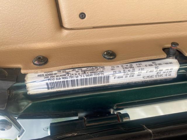 1999 Forest Green Pearl /Camel/Dark Green Jeep Wrangler Sahara AUYO AC 6 CYL LOW MILES 47,009 (1J4FY49S0XP) with an 4.0L SMPI I6 Power Tech Engine engine, Automatic transmission, located at 4701 North Dixie Hwy, Pompano Beach, FL, 33064, (954) 422-2889, 26.240938, -80.123474 - OUR WEBPAGE FLORIDACARS1.COM HAS OVER 100 PHOTOS AND FREE CARFAX LINK 1999 Jeep Wrangler Sahara Utility (Blazer, Jimmy, Scout, etc.) 4.0L I6 F Gasoline 20 MPG Rear Wheel Drive w/ 4X4 Features 4WD/AWD ABS Brakes Air Conditioning Alloy Wheels AM/FM Stereo Automatic Transmission Cassette Player CD Audi - Photo#72