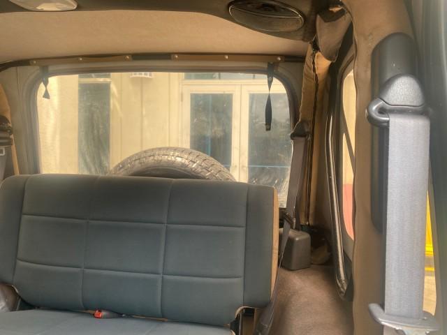 1999 Forest Green Pearl /Camel/Dark Green Jeep Wrangler Sahara AUYO AC 6 CYL LOW MILES 47,009 (1J4FY49S0XP) with an 4.0L SMPI I6 Power Tech Engine engine, Automatic transmission, located at 4701 North Dixie Hwy, Pompano Beach, FL, 33064, (954) 422-2889, 26.240938, -80.123474 - OUR WEBPAGE FLORIDACARS1.COM HAS OVER 100 PHOTOS AND FREE CARFAX LINK 1999 Jeep Wrangler Sahara Utility (Blazer, Jimmy, Scout, etc.) 4.0L I6 F Gasoline 20 MPG Rear Wheel Drive w/ 4X4 Features 4WD/AWD ABS Brakes Air Conditioning Alloy Wheels AM/FM Stereo Automatic Transmission Cassette Player CD Audi - Photo#76