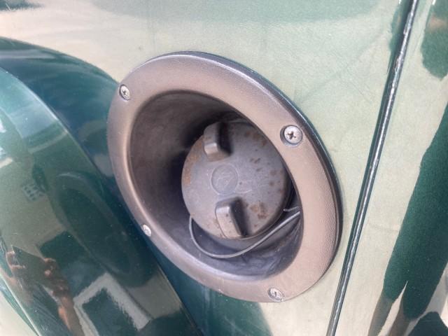 1999 Forest Green Pearl /Camel/Dark Green Jeep Wrangler Sahara AUYO AC 6 CYL LOW MILES 47,009 (1J4FY49S0XP) with an 4.0L SMPI I6 Power Tech Engine engine, Automatic transmission, located at 4701 North Dixie Hwy, Pompano Beach, FL, 33064, (954) 422-2889, 26.240938, -80.123474 - OUR WEBPAGE FLORIDACARS1.COM HAS OVER 100 PHOTOS AND FREE CARFAX LINK 1999 Jeep Wrangler Sahara Utility (Blazer, Jimmy, Scout, etc.) 4.0L I6 F Gasoline 20 MPG Rear Wheel Drive w/ 4X4 Features 4WD/AWD ABS Brakes Air Conditioning Alloy Wheels AM/FM Stereo Automatic Transmission Cassette Player CD Audi - Photo#81