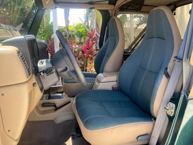 1999 Forest Green Pearl /Camel/Dark Green Jeep Wrangler Sahara AUYO AC 6 CYL LOW MILES 47,009 (1J4FY49S0XP) with an 4.0L SMPI I6 Power Tech Engine engine, Automatic transmission, located at 4701 North Dixie Hwy, Pompano Beach, FL, 33064, (954) 422-2889, 26.240938, -80.123474 - OUR WEBPAGE FLORIDACARS1.COM HAS OVER 100 PHOTOS AND FREE CARFAX LINK 1999 Jeep Wrangler Sahara Utility (Blazer, Jimmy, Scout, etc.) 4.0L I6 F Gasoline 20 MPG Rear Wheel Drive w/ 4X4 Features 4WD/AWD ABS Brakes Air Conditioning Alloy Wheels AM/FM Stereo Automatic Transmission Cassette Player CD Audi - Photo#10