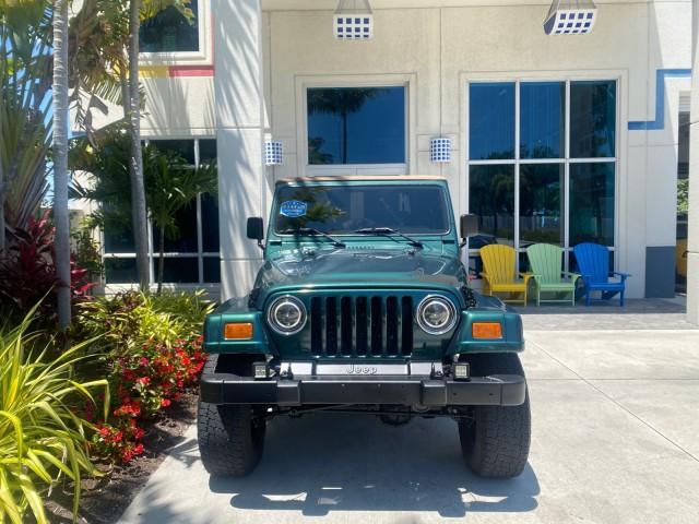 1999 Forest Green Pearl /Camel/Dark Green Jeep Wrangler Sahara AUYO AC 6 CYL LOW MILES 47,009 (1J4FY49S0XP) with an 4.0L SMPI I6 Power Tech Engine engine, Automatic transmission, located at 4701 North Dixie Hwy, Pompano Beach, FL, 33064, (954) 422-2889, 26.240938, -80.123474 - OUR WEBPAGE FLORIDACARS1.COM HAS OVER 100 PHOTOS AND FREE CARFAX LINK 1999 Jeep Wrangler Sahara Utility (Blazer, Jimmy, Scout, etc.) 4.0L I6 F Gasoline 20 MPG Rear Wheel Drive w/ 4X4 Features 4WD/AWD ABS Brakes Air Conditioning Alloy Wheels AM/FM Stereo Automatic Transmission Cassette Player CD Audi - Photo#26
