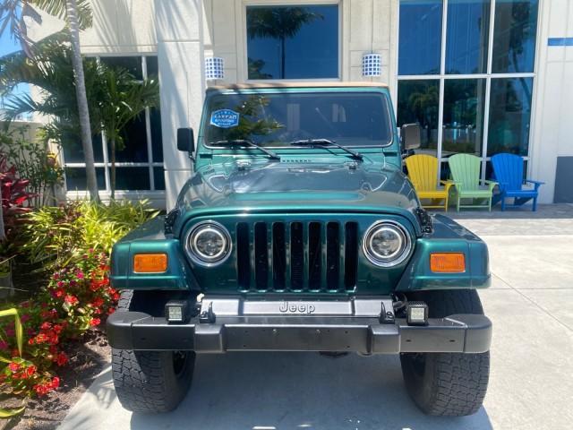 1999 Forest Green Pearl /Camel/Dark Green Jeep Wrangler Sahara AUYO AC 6 CYL LOW MILES 47,009 (1J4FY49S0XP) with an 4.0L SMPI I6 Power Tech Engine engine, Automatic transmission, located at 4701 North Dixie Hwy, Pompano Beach, FL, 33064, (954) 422-2889, 26.240938, -80.123474 - OUR WEBPAGE FLORIDACARS1.COM HAS OVER 100 PHOTOS AND FREE CARFAX LINK 1999 Jeep Wrangler Sahara Utility (Blazer, Jimmy, Scout, etc.) 4.0L I6 F Gasoline 20 MPG Rear Wheel Drive w/ 4X4 Features 4WD/AWD ABS Brakes Air Conditioning Alloy Wheels AM/FM Stereo Automatic Transmission Cassette Player CD Audi - Photo#27