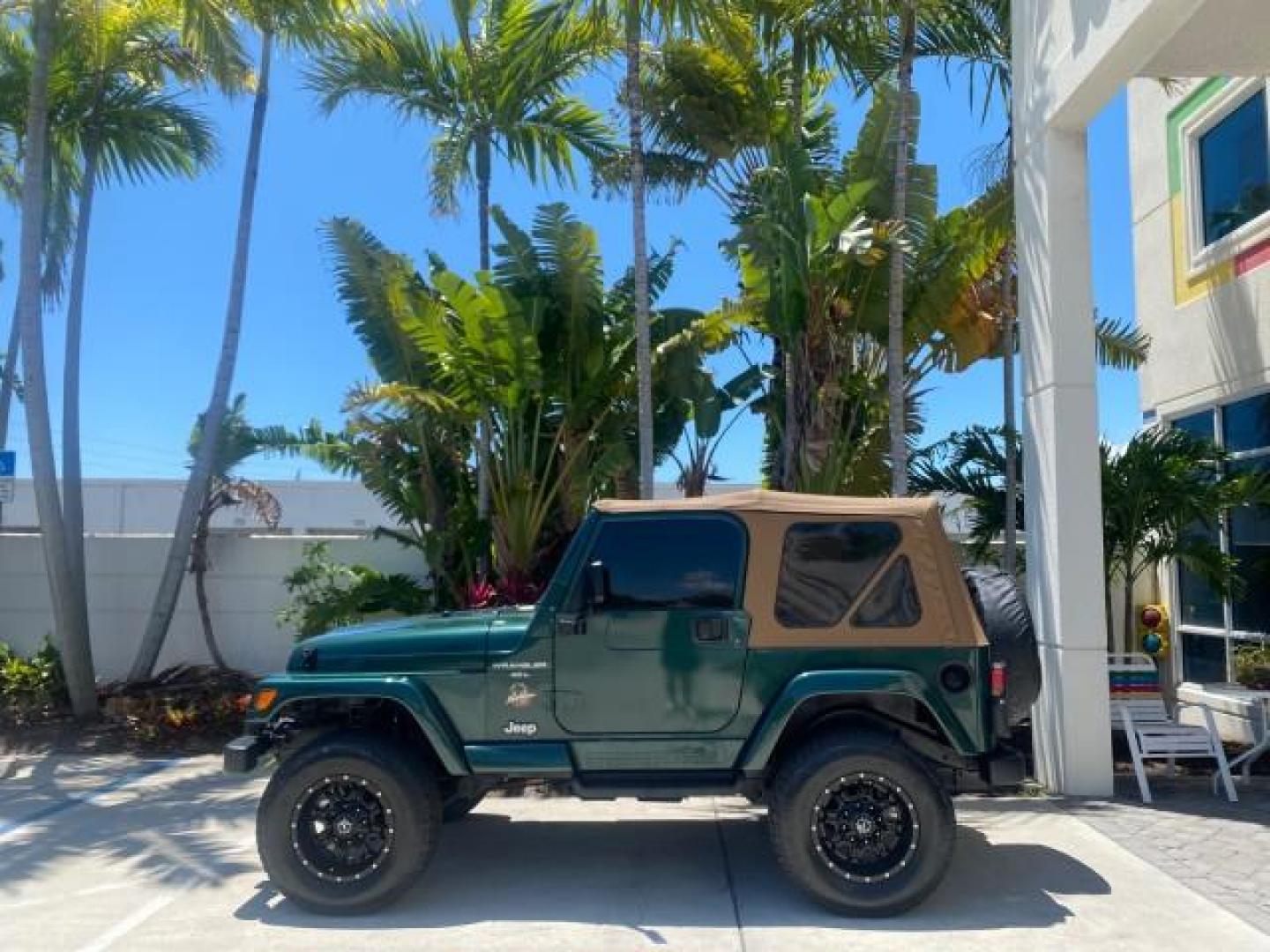 1999 Forest Green Pearl /Camel/Dark Green Jeep Wrangler Sahara AUYO AC 6 CYL LOW MILES 47,009 (1J4FY49S0XP) with an 4.0L SMPI I6 Power Tech Engine engine, Automatic transmission, located at 4701 North Dixie Hwy, Pompano Beach, FL, 33064, (954) 422-2889, 26.240938, -80.123474 - OUR WEBPAGE FLORIDACARS1.COM HAS OVER 100 PHOTOS AND FREE CARFAX LINK 1999 Jeep Wrangler Sahara Utility (Blazer, Jimmy, Scout, etc.) 4.0L I6 F Gasoline 20 MPG Rear Wheel Drive w/ 4X4 Features 4WD/AWD ABS Brakes Air Conditioning Alloy Wheels AM/FM Stereo Automatic Transmission Cassette Player CD Audi - Photo#30