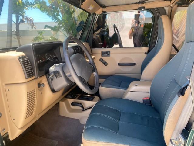 1999 Forest Green Pearl /Camel/Dark Green Jeep Wrangler Sahara AUYO AC 6 CYL LOW MILES 47,009 (1J4FY49S0XP) with an 4.0L SMPI I6 Power Tech Engine engine, Automatic transmission, located at 4701 North Dixie Hwy, Pompano Beach, FL, 33064, (954) 422-2889, 26.240938, -80.123474 - OUR WEBPAGE FLORIDACARS1.COM HAS OVER 100 PHOTOS AND FREE CARFAX LINK 1999 Jeep Wrangler Sahara Utility (Blazer, Jimmy, Scout, etc.) 4.0L I6 F Gasoline 20 MPG Rear Wheel Drive w/ 4X4 Features 4WD/AWD ABS Brakes Air Conditioning Alloy Wheels AM/FM Stereo Automatic Transmission Cassette Player CD Audi - Photo#48