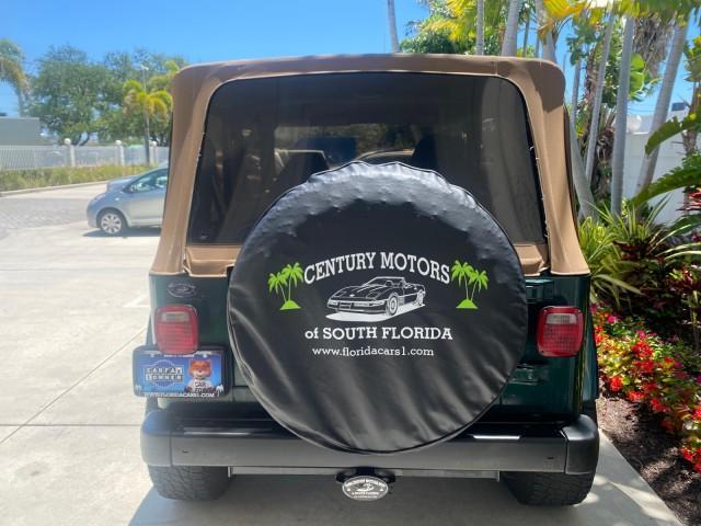 1999 Forest Green Pearl /Camel/Dark Green Jeep Wrangler Sahara AUYO AC 6 CYL LOW MILES 47,009 (1J4FY49S0XP) with an 4.0L SMPI I6 Power Tech Engine engine, Automatic transmission, located at 4701 North Dixie Hwy, Pompano Beach, FL, 33064, (954) 422-2889, 26.240938, -80.123474 - OUR WEBPAGE FLORIDACARS1.COM HAS OVER 100 PHOTOS AND FREE CARFAX LINK 1999 Jeep Wrangler Sahara Utility (Blazer, Jimmy, Scout, etc.) 4.0L I6 F Gasoline 20 MPG Rear Wheel Drive w/ 4X4 Features 4WD/AWD ABS Brakes Air Conditioning Alloy Wheels AM/FM Stereo Automatic Transmission Cassette Player CD Audi - Photo#83