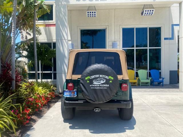 1999 Forest Green Pearl /Camel/Dark Green Jeep Wrangler Sahara AUYO AC 6 CYL LOW MILES 47,009 (1J4FY49S0XP) with an 4.0L SMPI I6 Power Tech Engine engine, Automatic transmission, located at 4701 North Dixie Hwy, Pompano Beach, FL, 33064, (954) 422-2889, 26.240938, -80.123474 - OUR WEBPAGE FLORIDACARS1.COM HAS OVER 100 PHOTOS AND FREE CARFAX LINK 1999 Jeep Wrangler Sahara Utility (Blazer, Jimmy, Scout, etc.) 4.0L I6 F Gasoline 20 MPG Rear Wheel Drive w/ 4X4 Features 4WD/AWD ABS Brakes Air Conditioning Alloy Wheels AM/FM Stereo Automatic Transmission Cassette Player CD Audi - Photo#88