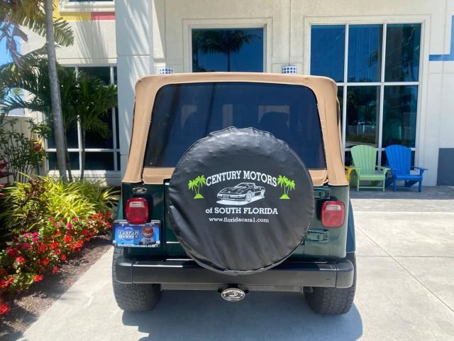 1999 Forest Green Pearl /Camel/Dark Green Jeep Wrangler Sahara AUYO AC 6 CYL LOW MILES 47,009 (1J4FY49S0XP) with an 4.0L SMPI I6 Power Tech Engine engine, Automatic transmission, located at 4701 North Dixie Hwy, Pompano Beach, FL, 33064, (954) 422-2889, 26.240938, -80.123474 - OUR WEBPAGE FLORIDACARS1.COM HAS OVER 100 PHOTOS AND FREE CARFAX LINK 1999 Jeep Wrangler Sahara Utility (Blazer, Jimmy, Scout, etc.) 4.0L I6 F Gasoline 20 MPG Rear Wheel Drive w/ 4X4 Features 4WD/AWD ABS Brakes Air Conditioning Alloy Wheels AM/FM Stereo Automatic Transmission Cassette Player CD Audi - Photo#89