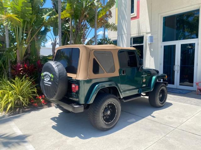 1999 Forest Green Pearl /Camel/Dark Green Jeep Wrangler Sahara AUYO AC 6 CYL LOW MILES 47,009 (1J4FY49S0XP) with an 4.0L SMPI I6 Power Tech Engine engine, Automatic transmission, located at 4701 North Dixie Hwy, Pompano Beach, FL, 33064, (954) 422-2889, 26.240938, -80.123474 - OUR WEBPAGE FLORIDACARS1.COM HAS OVER 100 PHOTOS AND FREE CARFAX LINK 1999 Jeep Wrangler Sahara Utility (Blazer, Jimmy, Scout, etc.) 4.0L I6 F Gasoline 20 MPG Rear Wheel Drive w/ 4X4 Features 4WD/AWD ABS Brakes Air Conditioning Alloy Wheels AM/FM Stereo Automatic Transmission Cassette Player CD Audi - Photo#90