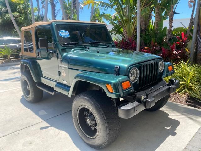 1999 Forest Green Pearl /Camel/Dark Green Jeep Wrangler Sahara AUYO AC 6 CYL LOW MILES 47,009 (1J4FY49S0XP) with an 4.0L SMPI I6 Power Tech Engine engine, Automatic transmission, located at 4701 North Dixie Hwy, Pompano Beach, FL, 33064, (954) 422-2889, 26.240938, -80.123474 - OUR WEBPAGE FLORIDACARS1.COM HAS OVER 100 PHOTOS AND FREE CARFAX LINK 1999 Jeep Wrangler Sahara Utility (Blazer, Jimmy, Scout, etc.) 4.0L I6 F Gasoline 20 MPG Rear Wheel Drive w/ 4X4 Features 4WD/AWD ABS Brakes Air Conditioning Alloy Wheels AM/FM Stereo Automatic Transmission Cassette Player CD Audi - Photo#95