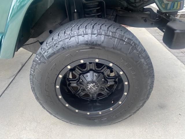 1999 Forest Green Pearl /Camel/Dark Green Jeep Wrangler Sahara AUYO AC 6 CYL LOW MILES 47,009 (1J4FY49S0XP) with an 4.0L SMPI I6 Power Tech Engine engine, Automatic transmission, located at 4701 North Dixie Hwy, Pompano Beach, FL, 33064, (954) 422-2889, 26.240938, -80.123474 - OUR WEBPAGE FLORIDACARS1.COM HAS OVER 100 PHOTOS AND FREE CARFAX LINK 1999 Jeep Wrangler Sahara Utility (Blazer, Jimmy, Scout, etc.) 4.0L I6 F Gasoline 20 MPG Rear Wheel Drive w/ 4X4 Features 4WD/AWD ABS Brakes Air Conditioning Alloy Wheels AM/FM Stereo Automatic Transmission Cassette Player CD Audi - Photo#98