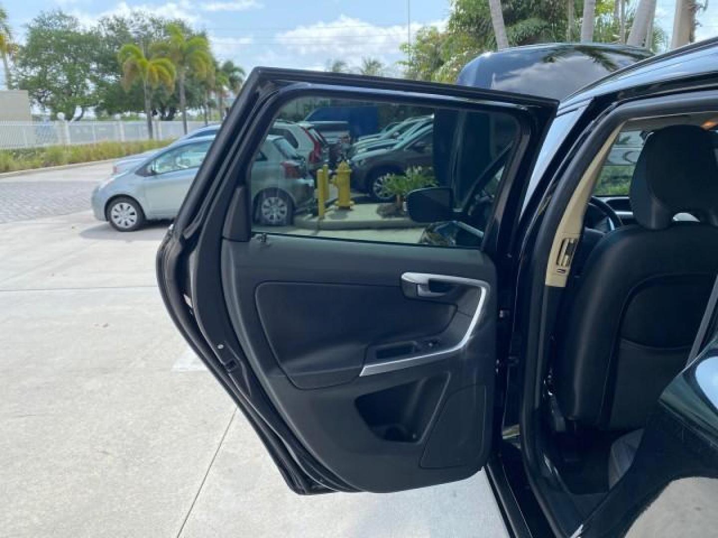 2010 Black Stone /Anthracite Black Volvo XC60 3.0T AWD SUV SUNROOF (YV4992DZXA2) with an 3.0L DOHC 24-Valve Turbocharged I6 Engine engine, Automatic transmission, located at 4701 North Dixie Hwy, Pompano Beach, FL, 33064, (954) 422-2889, 26.240938, -80.123474 - OUR WEBPAGE FLORIDACARS1.COM HAS OVER 100 PHOTOS AND FREE CARFAX LINK 2010 Volvo XC60 T6 4WD 4 Door Wagon/Sport Utility 3.0L I6 F DOHC 24V Gasoline 25 MPG All Wheel Drive Features 4WD/AWD ABS Brakes Air Conditioning Alloy Wheels AM/FM Stereo Automatic Transmission Auxiliary Audio Input Bluetooth Tec- Photo#13