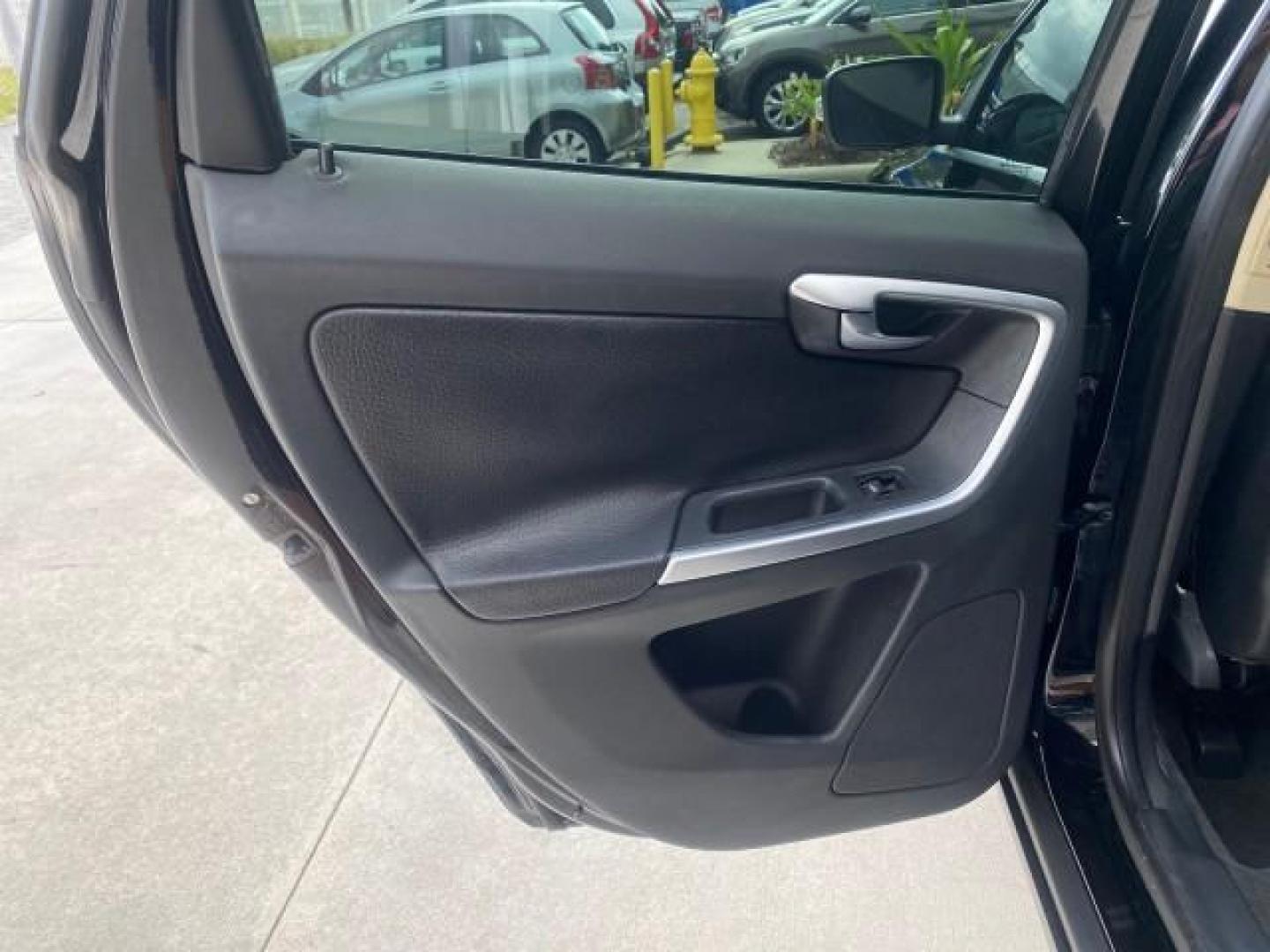 2010 Black Stone /Anthracite Black Volvo XC60 3.0T AWD SUV SUNROOF (YV4992DZXA2) with an 3.0L DOHC 24-Valve Turbocharged I6 Engine engine, Automatic transmission, located at 4701 North Dixie Hwy, Pompano Beach, FL, 33064, (954) 422-2889, 26.240938, -80.123474 - OUR WEBPAGE FLORIDACARS1.COM HAS OVER 100 PHOTOS AND FREE CARFAX LINK 2010 Volvo XC60 T6 4WD 4 Door Wagon/Sport Utility 3.0L I6 F DOHC 24V Gasoline 25 MPG All Wheel Drive Features 4WD/AWD ABS Brakes Air Conditioning Alloy Wheels AM/FM Stereo Automatic Transmission Auxiliary Audio Input Bluetooth Tec- Photo#75