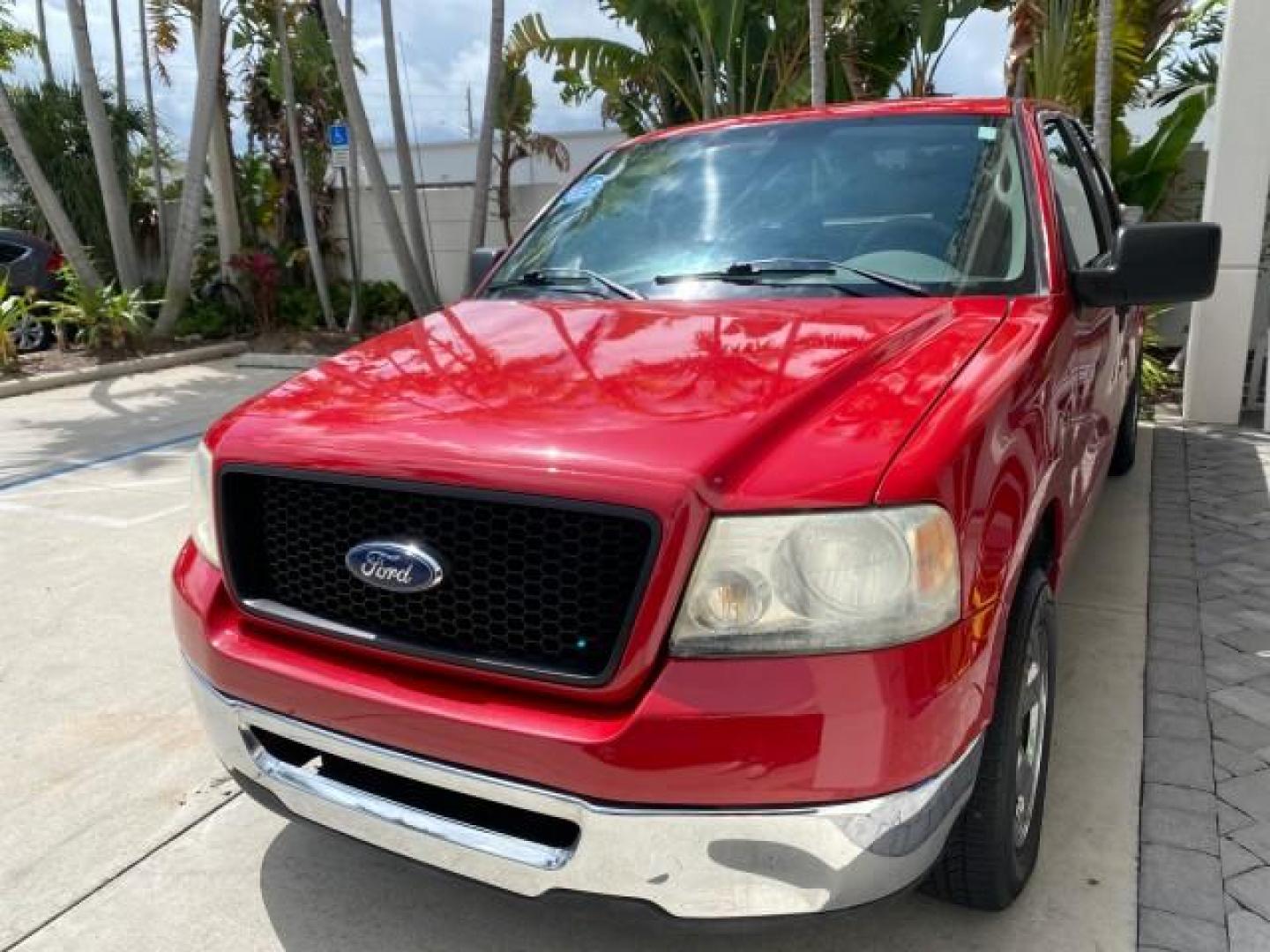 2006 Bright Red /Flint Ford F-150 XLT 4.6 V8 FL LOW MILES 72,936 (1FTRX12W76N) with an 4.6L EFI V8 Engine engine, Automatic transmission, located at 4701 North Dixie Hwy, Pompano Beach, FL, 33064, (954) 422-2889, 26.240938, -80.123474 - OUR WEBPAGE FLORIDACARS1.COM HAS OVER 100 PHOTOS AND FREE CARFAX LINK 2006 Ford F-150 XLT 4 Door Extended Cab Pickup 4.6L V8 F Gasoline 19 MPG Rear Wheel Drive Features ABS Brakes Air Conditioning AM/FM Stereo Automatic Transmission Bed Liner CD Audio Cloth Seats Cruise Control Power Locks Power Mir - Photo#4