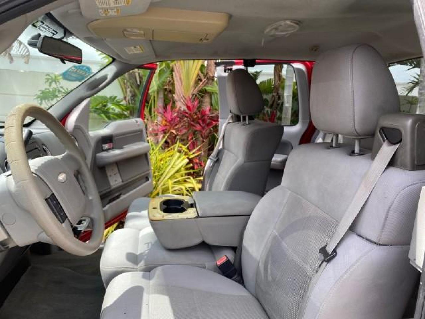 2006 Bright Red /Flint Ford F-150 XLT 4.6 V8 FL LOW MILES 72,936 (1FTRX12W76N) with an 4.6L EFI V8 Engine engine, Automatic transmission, located at 4701 North Dixie Hwy, Pompano Beach, FL, 33064, (954) 422-2889, 26.240938, -80.123474 - OUR WEBPAGE FLORIDACARS1.COM HAS OVER 100 PHOTOS AND FREE CARFAX LINK 2006 Ford F-150 XLT 4 Door Extended Cab Pickup 4.6L V8 F Gasoline 19 MPG Rear Wheel Drive Features ABS Brakes Air Conditioning AM/FM Stereo Automatic Transmission Bed Liner CD Audio Cloth Seats Cruise Control Power Locks Power Mir - Photo#11