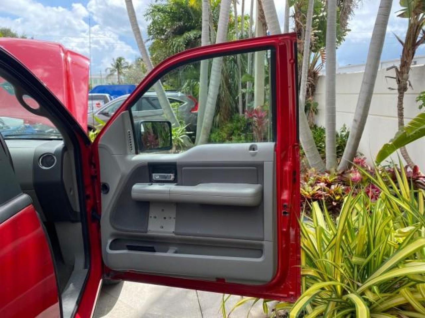 2006 Bright Red /Flint Ford F-150 XLT 4.6 V8 FL LOW MILES 72,936 (1FTRX12W76N) with an 4.6L EFI V8 Engine engine, Automatic transmission, located at 4701 North Dixie Hwy, Pompano Beach, FL, 33064, (954) 422-2889, 26.240938, -80.123474 - OUR WEBPAGE FLORIDACARS1.COM HAS OVER 100 PHOTOS AND FREE CARFAX LINK 2006 Ford F-150 XLT 4 Door Extended Cab Pickup 4.6L V8 F Gasoline 19 MPG Rear Wheel Drive Features ABS Brakes Air Conditioning AM/FM Stereo Automatic Transmission Bed Liner CD Audio Cloth Seats Cruise Control Power Locks Power Mir - Photo#12