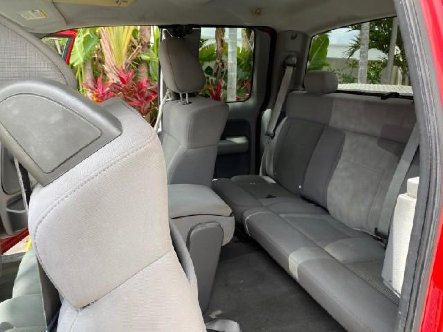 2006 Bright Red /Flint Ford F-150 XLT 4.6 V8 FL LOW MILES 72,936 (1FTRX12W76N) with an 4.6L EFI V8 Engine engine, Automatic transmission, located at 4701 North Dixie Hwy, Pompano Beach, FL, 33064, (954) 422-2889, 26.240938, -80.123474 - OUR WEBPAGE FLORIDACARS1.COM HAS OVER 100 PHOTOS AND FREE CARFAX LINK 2006 Ford F-150 XLT 4 Door Extended Cab Pickup 4.6L V8 F Gasoline 19 MPG Rear Wheel Drive Features ABS Brakes Air Conditioning AM/FM Stereo Automatic Transmission Bed Liner CD Audio Cloth Seats Cruise Control Power Locks Power Mir - Photo#14