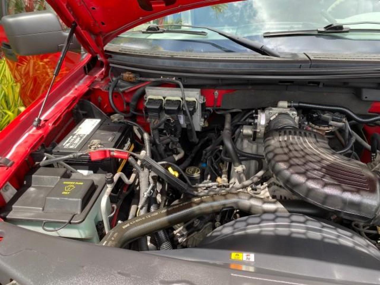 2006 Bright Red /Flint Ford F-150 XLT 4.6 V8 FL LOW MILES 72,936 (1FTRX12W76N) with an 4.6L EFI V8 Engine engine, Automatic transmission, located at 4701 North Dixie Hwy, Pompano Beach, FL, 33064, (954) 422-2889, 26.240938, -80.123474 - OUR WEBPAGE FLORIDACARS1.COM HAS OVER 100 PHOTOS AND FREE CARFAX LINK 2006 Ford F-150 XLT 4 Door Extended Cab Pickup 4.6L V8 F Gasoline 19 MPG Rear Wheel Drive Features ABS Brakes Air Conditioning AM/FM Stereo Automatic Transmission Bed Liner CD Audio Cloth Seats Cruise Control Power Locks Power Mir - Photo#25