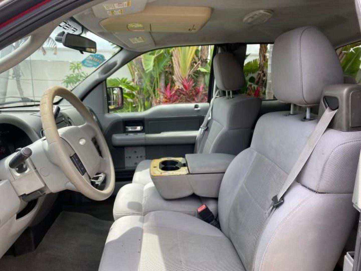 2006 Bright Red /Flint Ford F-150 XLT 4.6 V8 FL LOW MILES 72,936 (1FTRX12W76N) with an 4.6L EFI V8 Engine engine, Automatic transmission, located at 4701 North Dixie Hwy, Pompano Beach, FL, 33064, (954) 422-2889, 26.240938, -80.123474 - OUR WEBPAGE FLORIDACARS1.COM HAS OVER 100 PHOTOS AND FREE CARFAX LINK 2006 Ford F-150 XLT 4 Door Extended Cab Pickup 4.6L V8 F Gasoline 19 MPG Rear Wheel Drive Features ABS Brakes Air Conditioning AM/FM Stereo Automatic Transmission Bed Liner CD Audio Cloth Seats Cruise Control Power Locks Power Mir - Photo#43