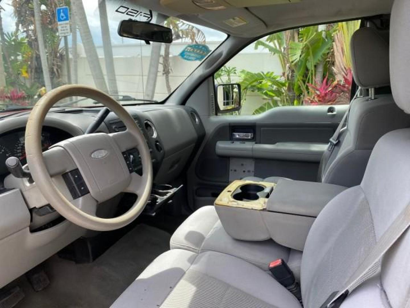 2006 Bright Red /Flint Ford F-150 XLT 4.6 V8 FL LOW MILES 72,936 (1FTRX12W76N) with an 4.6L EFI V8 Engine engine, Automatic transmission, located at 4701 North Dixie Hwy, Pompano Beach, FL, 33064, (954) 422-2889, 26.240938, -80.123474 - OUR WEBPAGE FLORIDACARS1.COM HAS OVER 100 PHOTOS AND FREE CARFAX LINK 2006 Ford F-150 XLT 4 Door Extended Cab Pickup 4.6L V8 F Gasoline 19 MPG Rear Wheel Drive Features ABS Brakes Air Conditioning AM/FM Stereo Automatic Transmission Bed Liner CD Audio Cloth Seats Cruise Control Power Locks Power Mir - Photo#45