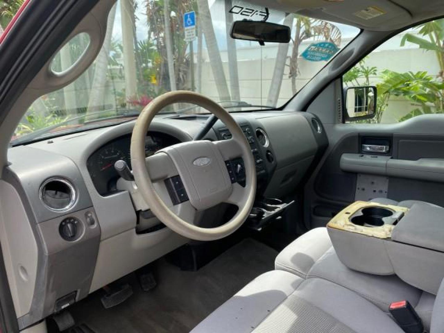 2006 Bright Red /Flint Ford F-150 XLT 4.6 V8 FL LOW MILES 72,936 (1FTRX12W76N) with an 4.6L EFI V8 Engine engine, Automatic transmission, located at 4701 North Dixie Hwy, Pompano Beach, FL, 33064, (954) 422-2889, 26.240938, -80.123474 - OUR WEBPAGE FLORIDACARS1.COM HAS OVER 100 PHOTOS AND FREE CARFAX LINK 2006 Ford F-150 XLT 4 Door Extended Cab Pickup 4.6L V8 F Gasoline 19 MPG Rear Wheel Drive Features ABS Brakes Air Conditioning AM/FM Stereo Automatic Transmission Bed Liner CD Audio Cloth Seats Cruise Control Power Locks Power Mir - Photo#47