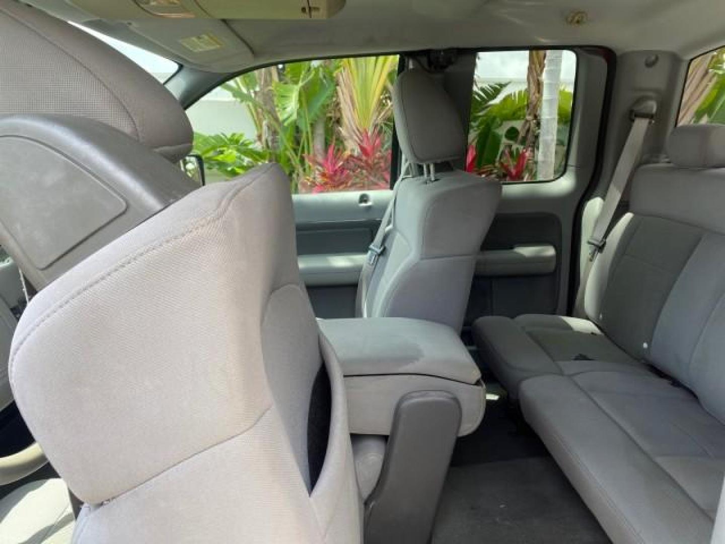 2006 Bright Red /Flint Ford F-150 XLT 4.6 V8 FL LOW MILES 72,936 (1FTRX12W76N) with an 4.6L EFI V8 Engine engine, Automatic transmission, located at 4701 North Dixie Hwy, Pompano Beach, FL, 33064, (954) 422-2889, 26.240938, -80.123474 - OUR WEBPAGE FLORIDACARS1.COM HAS OVER 100 PHOTOS AND FREE CARFAX LINK 2006 Ford F-150 XLT 4 Door Extended Cab Pickup 4.6L V8 F Gasoline 19 MPG Rear Wheel Drive Features ABS Brakes Air Conditioning AM/FM Stereo Automatic Transmission Bed Liner CD Audio Cloth Seats Cruise Control Power Locks Power Mir - Photo#66