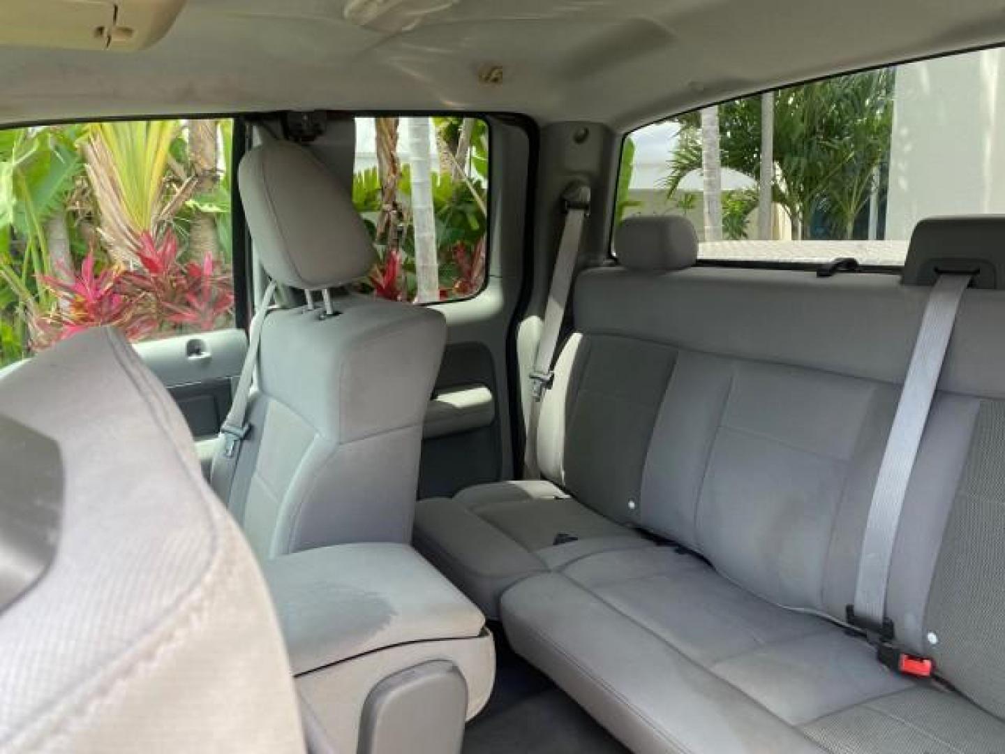 2006 Bright Red /Flint Ford F-150 XLT 4.6 V8 FL LOW MILES 72,936 (1FTRX12W76N) with an 4.6L EFI V8 Engine engine, Automatic transmission, located at 4701 North Dixie Hwy, Pompano Beach, FL, 33064, (954) 422-2889, 26.240938, -80.123474 - OUR WEBPAGE FLORIDACARS1.COM HAS OVER 100 PHOTOS AND FREE CARFAX LINK 2006 Ford F-150 XLT 4 Door Extended Cab Pickup 4.6L V8 F Gasoline 19 MPG Rear Wheel Drive Features ABS Brakes Air Conditioning AM/FM Stereo Automatic Transmission Bed Liner CD Audio Cloth Seats Cruise Control Power Locks Power Mir - Photo#67