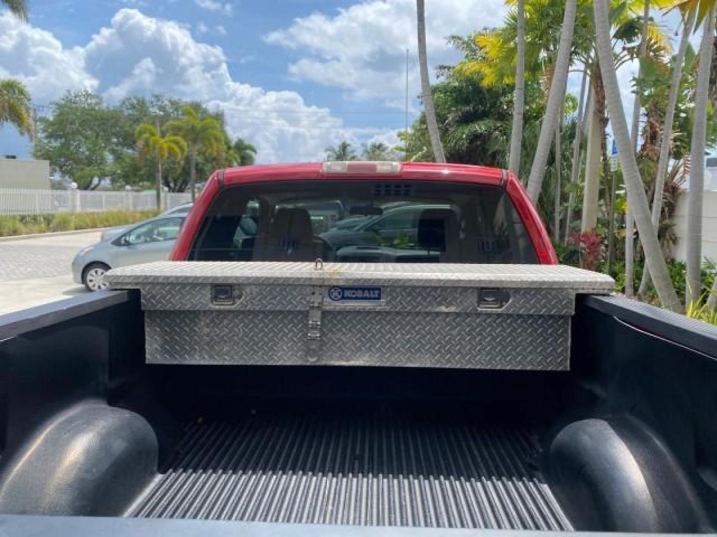 2006 Bright Red /Flint Ford F-150 XLT 4.6 V8 FL LOW MILES 72,936 (1FTRX12W76N) with an 4.6L EFI V8 Engine engine, Automatic transmission, located at 4701 North Dixie Hwy, Pompano Beach, FL, 33064, (954) 422-2889, 26.240938, -80.123474 - OUR WEBPAGE FLORIDACARS1.COM HAS OVER 100 PHOTOS AND FREE CARFAX LINK 2006 Ford F-150 XLT 4 Door Extended Cab Pickup 4.6L V8 F Gasoline 19 MPG Rear Wheel Drive Features ABS Brakes Air Conditioning AM/FM Stereo Automatic Transmission Bed Liner CD Audio Cloth Seats Cruise Control Power Locks Power Mir - Photo#82