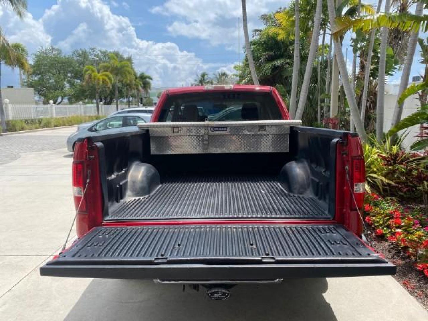 2006 Bright Red /Flint Ford F-150 XLT 4.6 V8 FL LOW MILES 72,936 (1FTRX12W76N) with an 4.6L EFI V8 Engine engine, Automatic transmission, located at 4701 North Dixie Hwy, Pompano Beach, FL, 33064, (954) 422-2889, 26.240938, -80.123474 - OUR WEBPAGE FLORIDACARS1.COM HAS OVER 100 PHOTOS AND FREE CARFAX LINK 2006 Ford F-150 XLT 4 Door Extended Cab Pickup 4.6L V8 F Gasoline 19 MPG Rear Wheel Drive Features ABS Brakes Air Conditioning AM/FM Stereo Automatic Transmission Bed Liner CD Audio Cloth Seats Cruise Control Power Locks Power Mir - Photo#87