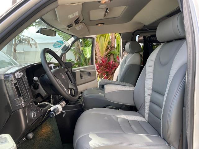 2013 Pure Silver Metallic /Medium Pewter GMC SAVANA HI TOP CONVERSION HANDICAP LIFT LOW MILES 24,857 (1GDS7DC40D1) with an 5.3L Vortec 1000 V8 SFI Flex-Fuel Engine engine, Automatic transmission, located at 4701 North Dixie Hwy, Pompano Beach, FL, 33064, (954) 422-2889, 26.240938, -80.123474 - OUR WEBPAGE FLORIDACARS1.COM HAS OVER 100 PHOTOS AND FREE CARFAX LINK 2013 GMC Savana 1500 MAJESTIC HI TOP CONVERSION VAN LEATHER Van 5.3L V8 F OHV 16V Flex Fuel 17 MPG Rear Wheel Drive Features ABS Brakes Air Conditioning AM/FM Stereo Automatic Transmission CD Audio Convenience Package Cruise Contr - Photo#10