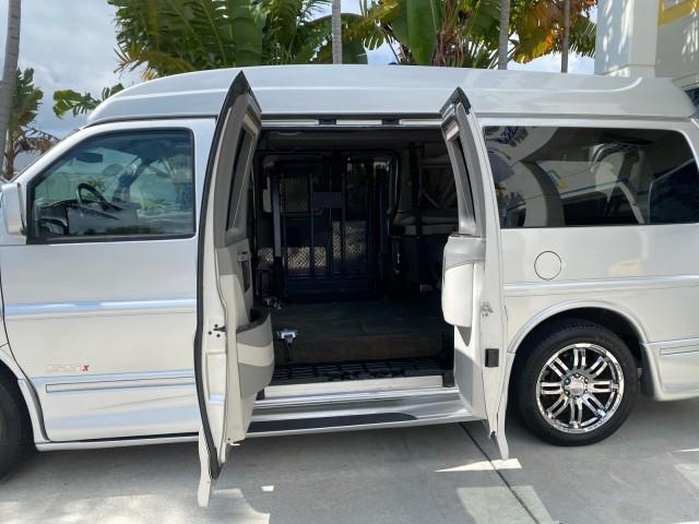 2013 Pure Silver Metallic /Medium Pewter GMC SAVANA HI TOP CONVERSION HANDICAP LIFT LOW MILES 24,857 (1GDS7DC40D1) with an 5.3L Vortec 1000 V8 SFI Flex-Fuel Engine engine, Automatic transmission, located at 4701 North Dixie Hwy, Pompano Beach, FL, 33064, (954) 422-2889, 26.240938, -80.123474 - OUR WEBPAGE FLORIDACARS1.COM HAS OVER 100 PHOTOS AND FREE CARFAX LINK 2013 GMC Savana 1500 MAJESTIC HI TOP CONVERSION VAN LEATHER Van 5.3L V8 F OHV 16V Flex Fuel 17 MPG Rear Wheel Drive Features ABS Brakes Air Conditioning AM/FM Stereo Automatic Transmission CD Audio Convenience Package Cruise Contr - Photo#13