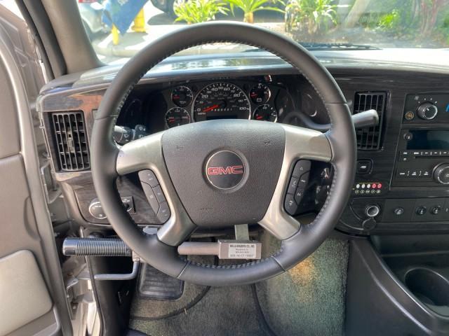 2013 Pure Silver Metallic /Medium Pewter GMC SAVANA HI TOP CONVERSION HANDICAP LIFT LOW MILES 24,857 (1GDS7DC40D1) with an 5.3L Vortec 1000 V8 SFI Flex-Fuel Engine engine, Automatic transmission, located at 4701 North Dixie Hwy, Pompano Beach, FL, 33064, (954) 422-2889, 26.240938, -80.123474 - OUR WEBPAGE FLORIDACARS1.COM HAS OVER 100 PHOTOS AND FREE CARFAX LINK 2013 GMC Savana 1500 MAJESTIC HI TOP CONVERSION VAN LEATHER Van 5.3L V8 F OHV 16V Flex Fuel 17 MPG Rear Wheel Drive Features ABS Brakes Air Conditioning AM/FM Stereo Automatic Transmission CD Audio Convenience Package Cruise Contr - Photo#50