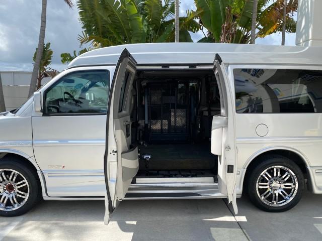 2013 Pure Silver Metallic /Medium Pewter GMC SAVANA HI TOP CONVERSION HANDICAP LIFT LOW MILES 24,857 (1GDS7DC40D1) with an 5.3L Vortec 1000 V8 SFI Flex-Fuel Engine engine, Automatic transmission, located at 4701 North Dixie Hwy, Pompano Beach, FL, 33064, (954) 422-2889, 26.240938, -80.123474 - OUR WEBPAGE FLORIDACARS1.COM HAS OVER 100 PHOTOS AND FREE CARFAX LINK 2013 GMC Savana 1500 MAJESTIC HI TOP CONVERSION VAN LEATHER Van 5.3L V8 F OHV 16V Flex Fuel 17 MPG Rear Wheel Drive Features ABS Brakes Air Conditioning AM/FM Stereo Automatic Transmission CD Audio Convenience Package Cruise Contr - Photo#80