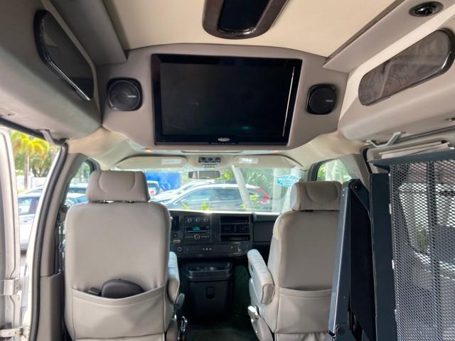 2013 Pure Silver Metallic /Medium Pewter GMC SAVANA HI TOP CONVERSION HANDICAP LIFT LOW MILES 24,857 (1GDS7DC40D1) with an 5.3L Vortec 1000 V8 SFI Flex-Fuel Engine engine, Automatic transmission, located at 4701 North Dixie Hwy, Pompano Beach, FL, 33064, (954) 422-2889, 26.240938, -80.123474 - OUR WEBPAGE FLORIDACARS1.COM HAS OVER 100 PHOTOS AND FREE CARFAX LINK 2013 GMC Savana 1500 MAJESTIC HI TOP CONVERSION VAN LEATHER Van 5.3L V8 F OHV 16V Flex Fuel 17 MPG Rear Wheel Drive Features ABS Brakes Air Conditioning AM/FM Stereo Automatic Transmission CD Audio Convenience Package Cruise Contr - Photo#89