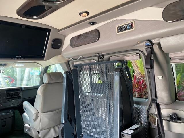 2013 Pure Silver Metallic /Medium Pewter GMC SAVANA HI TOP CONVERSION HANDICAP LIFT LOW MILES 24,857 (1GDS7DC40D1) with an 5.3L Vortec 1000 V8 SFI Flex-Fuel Engine engine, Automatic transmission, located at 4701 North Dixie Hwy, Pompano Beach, FL, 33064, (954) 422-2889, 26.240938, -80.123474 - OUR WEBPAGE FLORIDACARS1.COM HAS OVER 100 PHOTOS AND FREE CARFAX LINK 2013 GMC Savana 1500 MAJESTIC HI TOP CONVERSION VAN LEATHER Van 5.3L V8 F OHV 16V Flex Fuel 17 MPG Rear Wheel Drive Features ABS Brakes Air Conditioning AM/FM Stereo Automatic Transmission CD Audio Convenience Package Cruise Contr - Photo#96