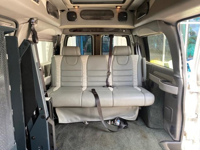 2013 Pure Silver Metallic /Medium Pewter GMC SAVANA HI TOP CONVERSION HANDICAP LIFT LOW MILES 24,857 (1GDS7DC40D1) with an 5.3L Vortec 1000 V8 SFI Flex-Fuel Engine engine, Automatic transmission, located at 4701 North Dixie Hwy, Pompano Beach, FL, 33064, (954) 422-2889, 26.240938, -80.123474 - OUR WEBPAGE FLORIDACARS1.COM HAS OVER 100 PHOTOS AND FREE CARFAX LINK 2013 GMC Savana 1500 MAJESTIC HI TOP CONVERSION VAN LEATHER Van 5.3L V8 F OHV 16V Flex Fuel 17 MPG Rear Wheel Drive Features ABS Brakes Air Conditioning AM/FM Stereo Automatic Transmission CD Audio Convenience Package Cruise Contr - Photo#99