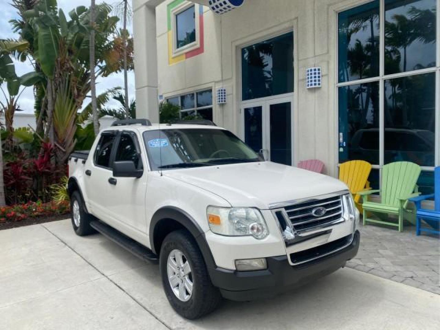 2009 White Suede /Camel Ford Explorer Sport Trac XLT LOW MILES 73,848 (1FMEU31E99U) with an 4.0L SOHC 12-Valve V6 Engine engine, Automatic transmission, located at 4701 North Dixie Hwy, Pompano Beach, FL, 33064, (954) 422-2889, 26.240938, -80.123474 - OUR WEBPAGE FLORIDACARS1.COM HAS OVER 100 PHOTOS AND FREE CARFAX LINK 2009 Ford Explorer Sport Trac XLT Sport Pickup 4.0L V6 F SOHC 12V Gasoline 21 MPG Rear Wheel Drive Features ABS Brakes Air Conditioning Alloy Wheels AM/FM Stereo Automatic Transmission Auxiliary Audio Input CD Audio Cloth Seats Cr - Photo#1