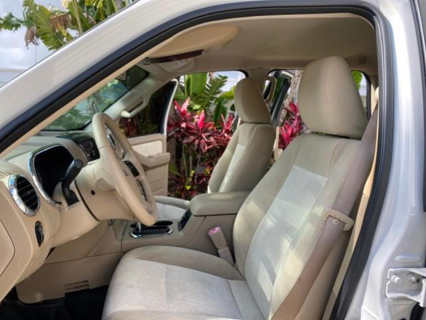 2009 White Suede /Camel Ford Explorer Sport Trac XLT LOW MILES 73,848 (1FMEU31E99U) with an 4.0L SOHC 12-Valve V6 Engine engine, Automatic transmission, located at 4701 North Dixie Hwy, Pompano Beach, FL, 33064, (954) 422-2889, 26.240938, -80.123474 - OUR WEBPAGE FLORIDACARS1.COM HAS OVER 100 PHOTOS AND FREE CARFAX LINK 2009 Ford Explorer Sport Trac XLT Sport Pickup 4.0L V6 F SOHC 12V Gasoline 21 MPG Rear Wheel Drive Features ABS Brakes Air Conditioning Alloy Wheels AM/FM Stereo Automatic Transmission Auxiliary Audio Input CD Audio Cloth Seats Cr - Photo#10