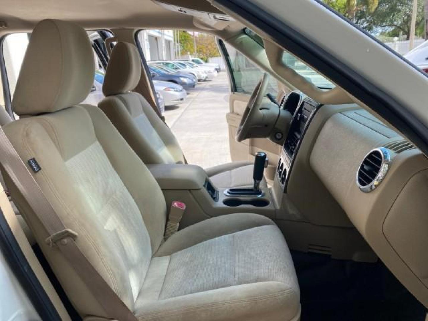 2009 White Suede /Camel Ford Explorer Sport Trac XLT LOW MILES 73,848 (1FMEU31E99U) with an 4.0L SOHC 12-Valve V6 Engine engine, Automatic transmission, located at 4701 North Dixie Hwy, Pompano Beach, FL, 33064, (954) 422-2889, 26.240938, -80.123474 - OUR WEBPAGE FLORIDACARS1.COM HAS OVER 100 PHOTOS AND FREE CARFAX LINK 2009 Ford Explorer Sport Trac XLT Sport Pickup 4.0L V6 F SOHC 12V Gasoline 21 MPG Rear Wheel Drive Features ABS Brakes Air Conditioning Alloy Wheels AM/FM Stereo Automatic Transmission Auxiliary Audio Input CD Audio Cloth Seats Cr - Photo#12